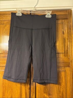 Athleta Black High-Rise Bike Shorts with Side Pockets